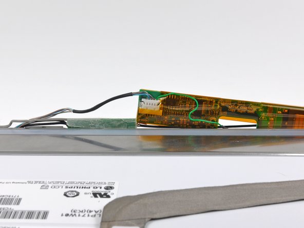 PowerBook G4 Aluminum 17" 1-1.67 GHz Display Inverter Replacement: step 8, image 1 of 2