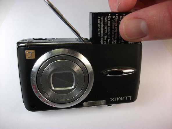 Panasonic Lumix DMC-FX01 On/ Off and Settings Button cover replacement: step 3, image 1 of 1