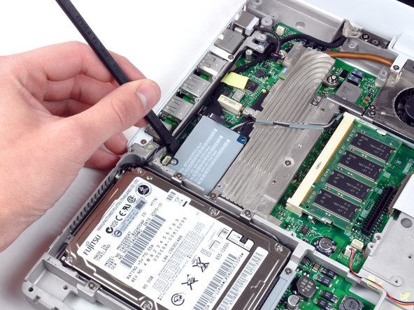 iBook G4 14" 1.42 GHz Logic Board Replacement: step 35, image 1 of 1