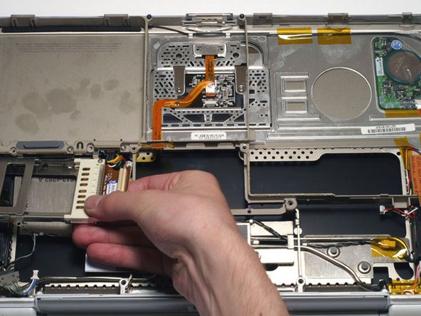 PowerBook G4 Titanium Onyx PC Card Cage Replacement: step 27, image 1 of 1