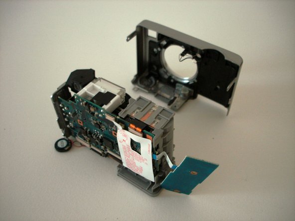 Sony Cyber-shot DSC-W5 battery compartment replacement: step 11, image 2 of 2