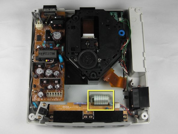 Sega Dreamcast Logic Board Removal: step 9, image 1 of 2