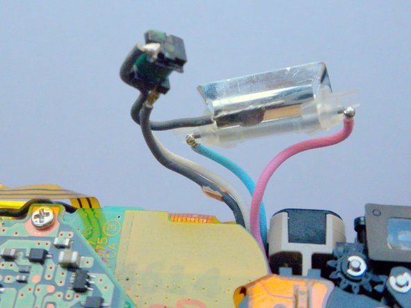 Olympus Stylus 410 Flash Replacement: step 13, image 3 of 3