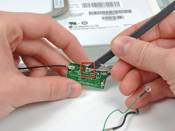 PowerBook G4 Aluminum 17" 1-1.67 GHz Inverter and Antenna Cables Replacement: step 36, image 1 of 2