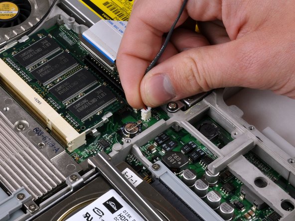 iBook G4 12" 1.33 GHz Reed Switch Board Replacement: step 31, image 1 of 1