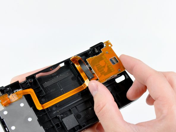 Nintendo DSi Trigger Button/SD Board Assembly: step 11, image 1 of 2