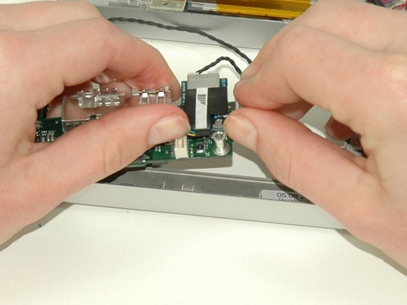 PowerBook G4 Aluminum 15" 1.5-1.67 GHz RJ-11 Board Replacement: step 43, image 1 of 1