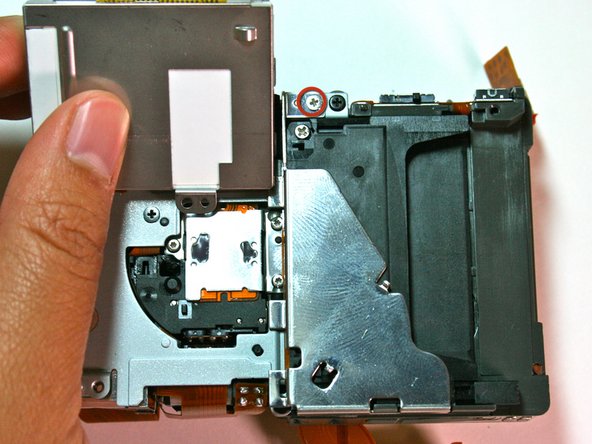 Canon Powershot S200 Camera lens Replacement: step 24, image 1 of 1