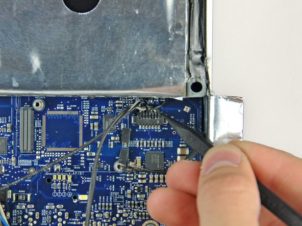 iMac G5 20" Model A1145 Speakers Replacement: step 20, image 1 of 2