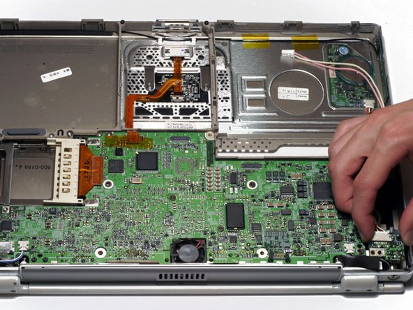 PowerBook G4 Titanium DVI PC Card Cage Replacement: step 20, image 1 of 1