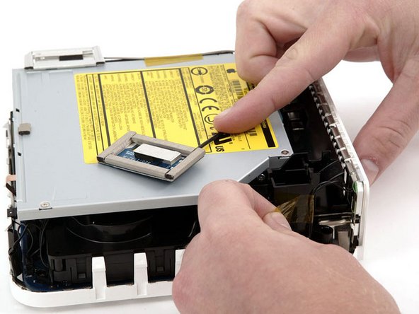 Mac mini (PowerPC) Speaker Replacement: step 6, image 1 of 1