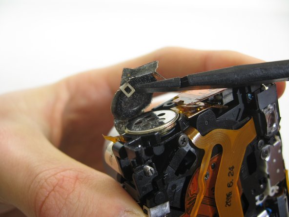 Disassembling Pentax Optio S4i Lens Assembly: step 19, image 3 of 3