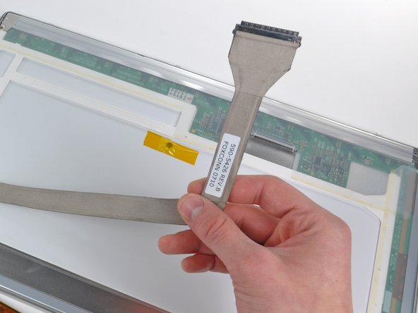 PowerBook G4 Aluminum 17" 1-1.67 GHz Front Display Bezel Replacement: step 41, image 1 of 1