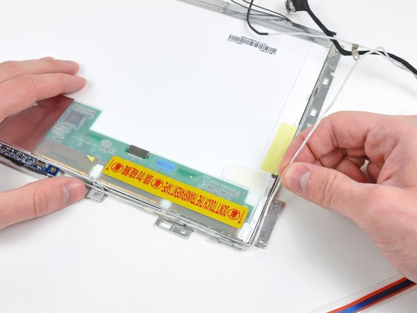 MacBook Core Duo LCD Mounts Replacement: step 56, image 1 of 1