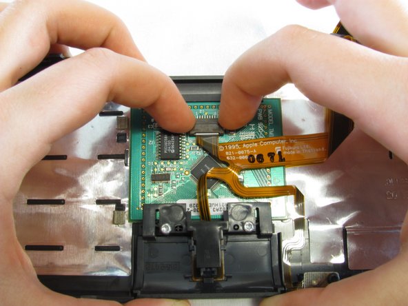 PowerBook 3400 M3553 Track Pad Replacement: step 10, image 1 of 3