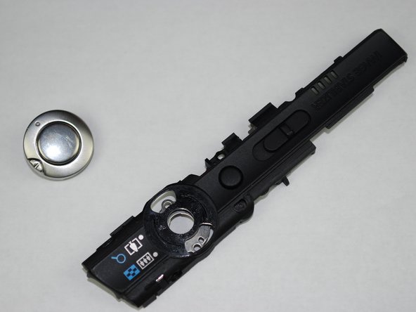 Canon PowerShot SD870 IS Shutter Release Button Replacement: step 15, image 2 of 2