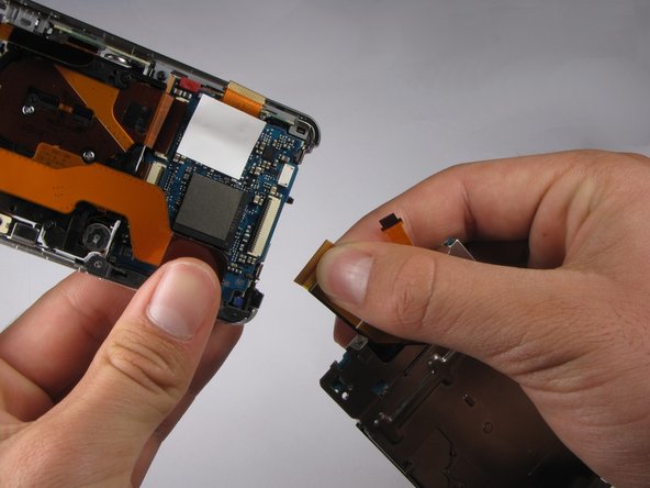 Repairing Sony Cyber-shot DSC-W290 Motherboard: step 13, image 2 of 2