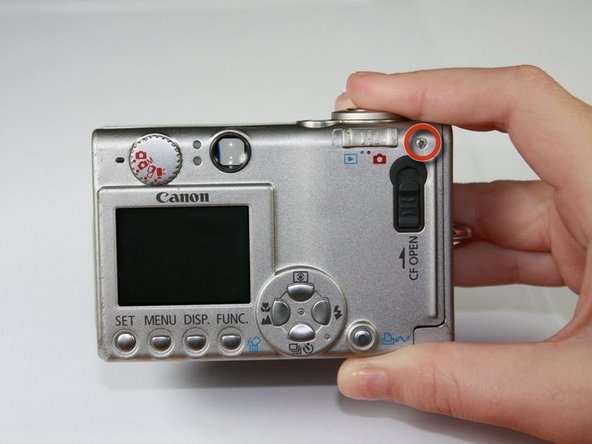 Canon PowerShot S410 Front Cover Replacement: step 4, image 1 of 1