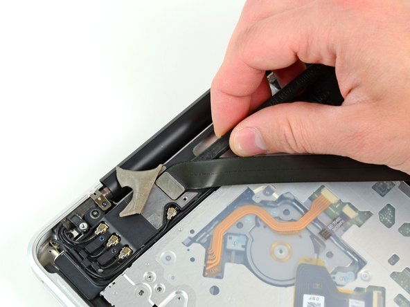 MacBook Pro 15" Unibody Early 2011 AirPort/Bluetooth Cable Replacement: step 7, image 1 of 2