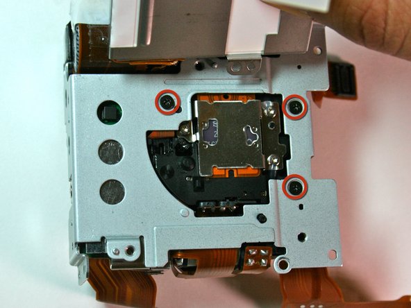 Canon Powershot S200 Camera lens Replacement: step 26, image 1 of 1