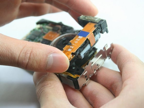 Disassembling Canon PowerShot SD1100 IS AV port and Logic board: step 14, image 1 of 1