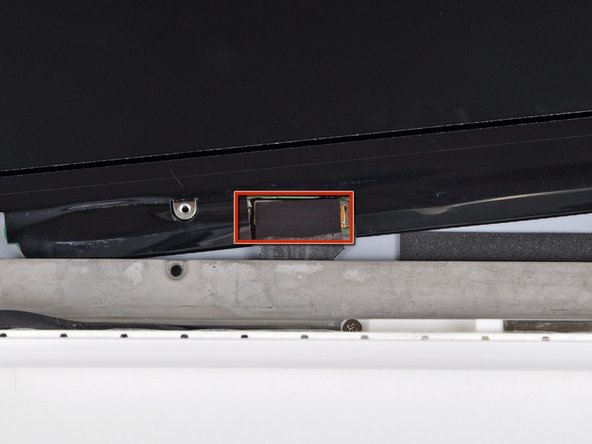 MacBook Unibody Model A1342 Antenna Cables Replacement: step 25, image 1 of 1