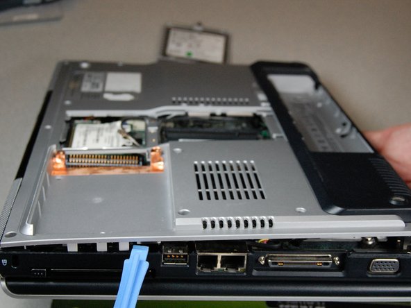HP Pavilion dv1000 Back Cover Replacement: step 21, image 1 of 2