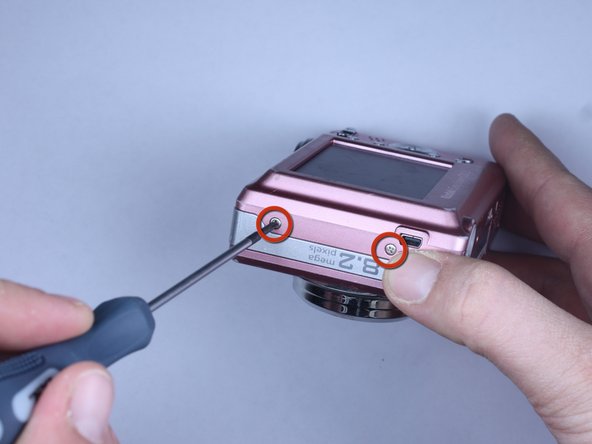 Disassembling Kodak Easyshare C813 Back Cover: step 6, image 2 of 3