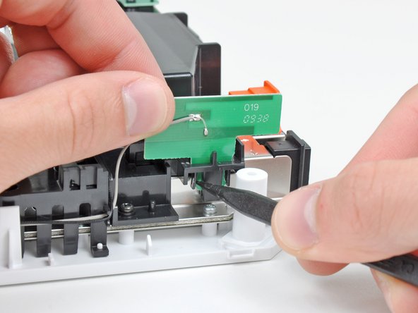 Nintendo Wii Wi-Fi Board Replacement: step 25, image 1 of 2