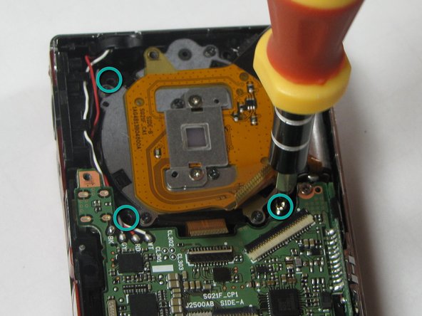 Sanyo VPC-X1200 shutter assembly replacement: step 8, image 1 of 2