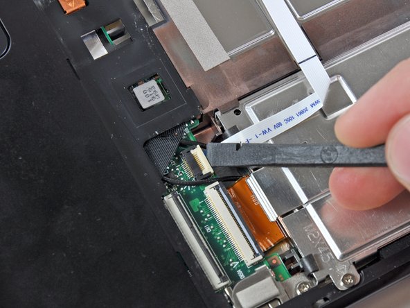 HP Mini 1000 PRAM Battery Replacement: step 7, image 1 of 2