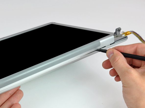 MacBook Pro 17" Models A1151 A1212 A1229 and A1261 Antenna Cover Replacement: step 17, image 1 of 2