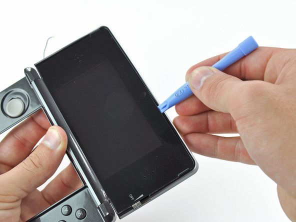 Nintendo 3DS Rear Display Bezel Replacement: step 24, image 1 of 2