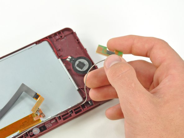 Nintendo DSi XL Camera Ribbon Replacement: step 30, image 1 of 2