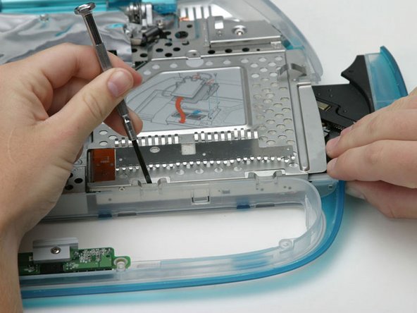 iBook G3 Clamshell Charger Board Replacement: step 19, image 1 of 1