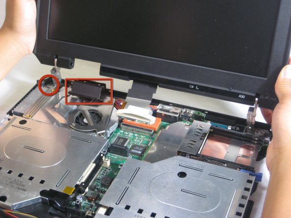 Disassembling IBM ThinkPad A30 Speakers: step 13, image 2 of 3