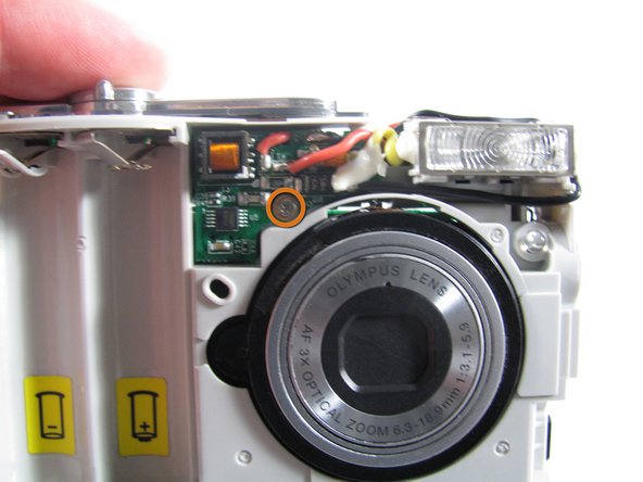 Removing Olympus FE-210 Flash Assembly: step 9, image 1 of 2