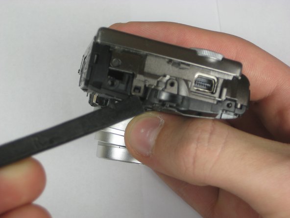 Disassembling Olympus Stylus 1010 Case: step 6, image 3 of 3