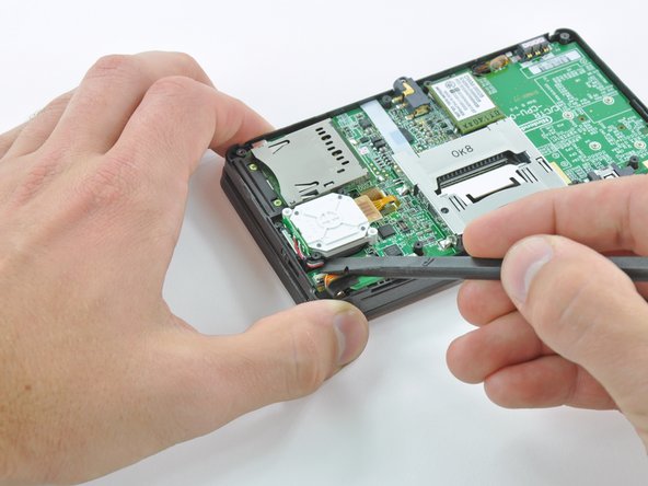 Nintendo 3DS Rear Display Bezel Replacement: step 7, image 1 of 3