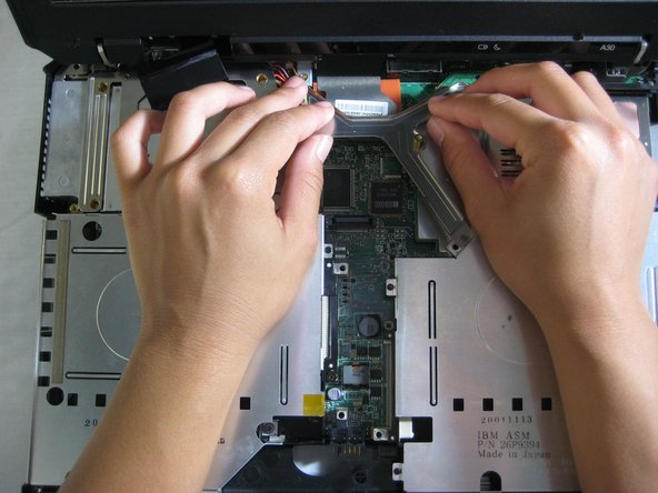 Disassembling IBM ThinkPad A30 Speakers: step 10, image 2 of 3