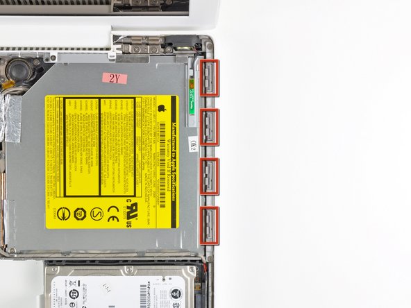 MacBook Core Duo Upper Case Clips Replacement: step 13, image 1 of 3