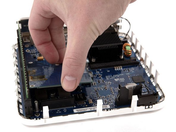Mac mini (PowerPC) Wireless Interface Board Replacement: step 11, image 1 of 1