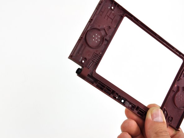 Nintendo DSi XL Front Bezel Replacement: step 43, image 1 of 2