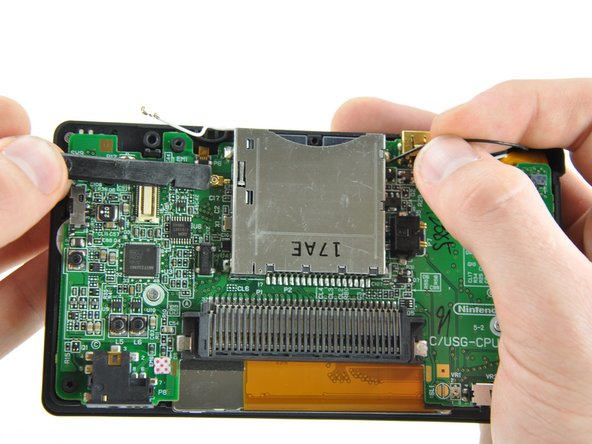 Nintendo DS Lite Front Display Bezel Replacement: step 12, image 1 of 3