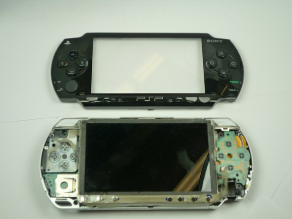 PSP 1000 UMD Door Replacement: step 6, image 2 of 2