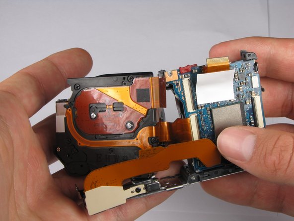 Repairing Sony Cyber-shot DSC-W290 Motherboard: step 19, image 1 of 3