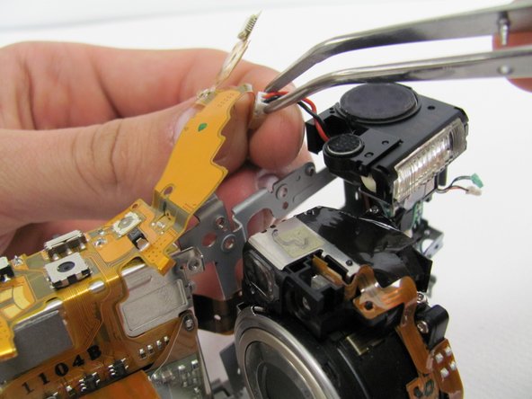 Canon PowerShot S500 Breakdown to Three Parts Replacement: step 29, image 1 of 2