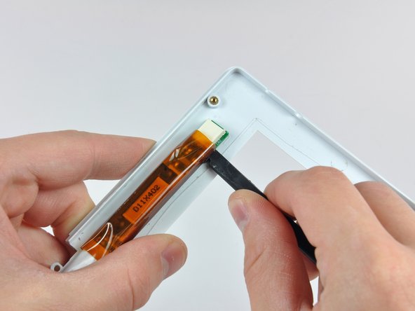 iBook G4 12" 800 MHz-1.2 GHz Front Display Bezel Replacement: step 68, image 1 of 2