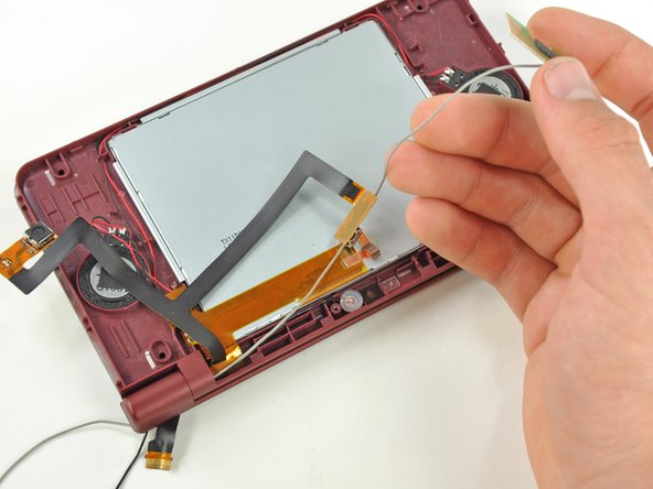Nintendo DSi XL Camera Ribbon Replacement: step 30, image 2 of 2