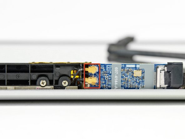 MacBook Pro 13" Unibody Mid 2010 AirPort Antenna Replacement: step 18, image 1 of 2